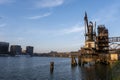 Old fashion rusty Port grain elevator. Industrial sea trading port bulk cargo zone in Rotterdam harbour Royalty Free Stock Photo