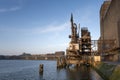 Old fashion rusty Port grain elevator. Industrial sea trading port bulk cargo zone in Rotterdam harbour Royalty Free Stock Photo