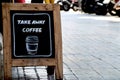 Take away coffee sign on the sidewalk