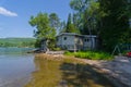 Old Wood Summer Cottage on Lake Royalty Free Stock Photo