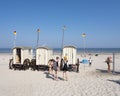 Old fashioned bathing carts used for changing on sunny beach of german island norderney