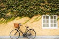 Old Fashioned Bicycle With Basket Against Ivy Covered Building In Oxford Royalty Free Stock Photo