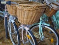 Old fashioned bicycles with woven baskets