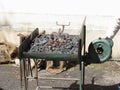 Old-fashioned blacksmith furnace with burning coals for iron work