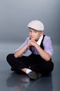 Old fashioned boy sitting Royalty Free Stock Photo