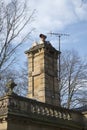 Old fashioned brick chimney with aerial, UK Royalty Free Stock Photo