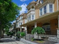 old fashioned brick houses with large verandas