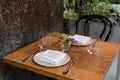 Old fashioned cafe terrace. Served table set at summer terrace cafe Royalty Free Stock Photo