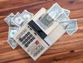 Old fashioned calculator and dollars Royalty Free Stock Photo