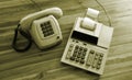 Old fashioned calculator and telephone Royalty Free Stock Photo