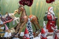 Old fashioned Christmas toys - Santa Claus, horse, dwarfs, and other figurines sold at the gift store