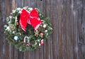 Old fashioned Christmas wreath western style rustic wreath on wood background