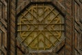 Old fashioned close up of vintage enter door with symmetrical ornament