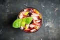 Old fashioned cocktail with blackberry liqueur and apple slices on rustic background Royalty Free Stock Photo