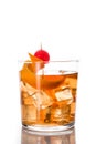 Old fashioned cocktail with orange and cherry isolated Royalty Free Stock Photo