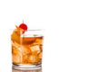 Old fashioned cocktail with orange and cherry isolated Royalty Free Stock Photo