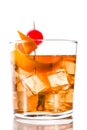 Old fashioned cocktail with orange and cherry isolated. Royalty Free Stock Photo