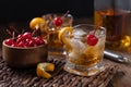 Old fashioned cocktail with orange peel and cherry Royalty Free Stock Photo