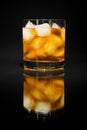 Old fashioned cognac glass on the black background