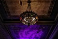 Old Fashioned Colorful Ceiling Lighting in Old Decaying Building