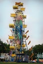 Old-fashioned colorful ferris wheel at a carnival in rural Kentucky.