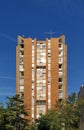 Old fashioned communist socialist high building with red bricks on a nice summer spring weather Royalty Free Stock Photo