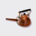 Old-fashioned copper kettle for drinking water with white background Royalty Free Stock Photo