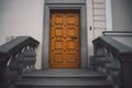 Old fashioned doors in classic style on old building facade background Royalty Free Stock Photo