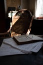 Old fashioned Dutch interior and room decoration in small fisherman`s houses in North-Holland, Enkhuizen, Netherlands. Table, boo