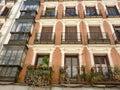 Old fashioned facade of the vintage building in Malasana district downtown Madrid, Spain Royalty Free Stock Photo