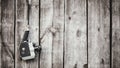 Old fashioned film camera hanging on wooden wall. Concept - movie of the 1970s-1980s Royalty Free Stock Photo