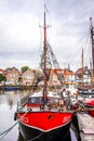 Old fashioned fishing boat in the harbor of Urk in the Netherlands Royalty Free Stock Photo