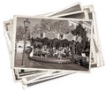 Old fashioned french carousel with horses Stack of old photos