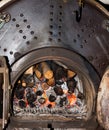Old fashioned furnace with burning coals Royalty Free Stock Photo