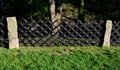 old-fashioned garden fencing. stone posts with mortise directly