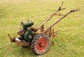 Old-fashioned garden tiller or rotovator Royalty Free Stock Photo
