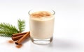 Old fashioned glass of homemade eggnog isolated on a white background
