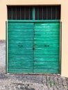 Old fashioned green garage door
