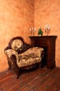 Old-fashioned interior with luxury armchair Royalty Free Stock Photo