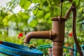 Old fashioned iron water pump. Royalty Free Stock Photo