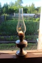 An old-fashioned kerosene lamp. Royalty Free Stock Photo