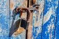 The old-fashioned latch on the door, the old castle, retro style