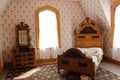 An old-fashioned late 19th century bedroom with floral pattern in a manor home in Sherbrooke village Nova Scotia Royalty Free Stock Photo