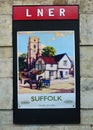 Old fashioned LNER railway advertisement poster for Suffolk 