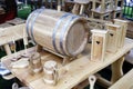 Old-fashioned, medieval wooden mug and barrel