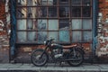 An old-fashioned motorcycle parked on the street Royalty Free Stock Photo