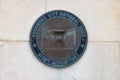 Old Fashioned Night Depository Cover on the wall of an old bank in the historic center of Pocomoke City