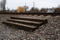 An old-fashioned pedestrian crossing over railway tracks Royalty Free Stock Photo