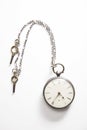 Old-fashioned pocket watch over white background Royalty Free Stock Photo