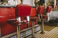 Red Booth Stools in a Diner Royalty Free Stock Photo